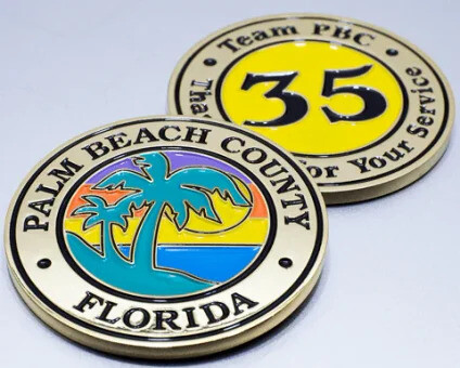 Front and back of a coin with full-color enamel on both sides
