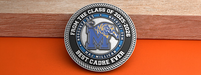 Silver ROTC cadre coin with a blue M and a leaping tiger, from a class of cadets